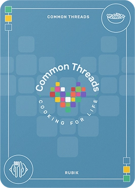 Common Threads Project Cover - a blue card with a light image of a heart made of squares in the background and the Common Threads logo in the foreground.