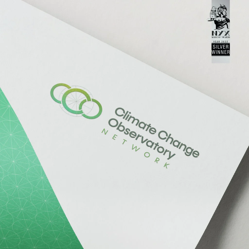 Climate Change Observatory Portifolio Logo over a paper